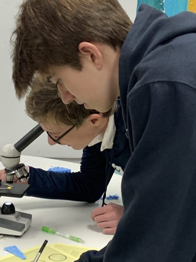 Two students working on a project in the lab.