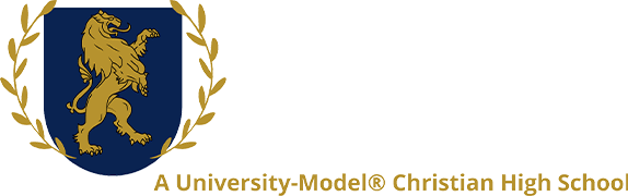 A green banner with white letters that say hope school academy.